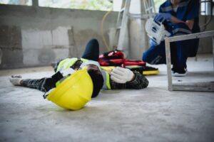 Workplace accidents at construction sites can include incidents such as workers falling from ladders, becoming unconscious due to electric shock, and other unsafe situations. 