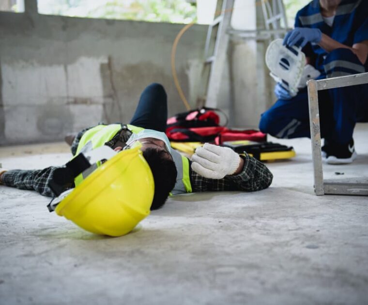 Workplace accidents at construction sites can include incidents such as workers falling from ladders, becoming unconscious due to electric shock, and other unsafe situations.