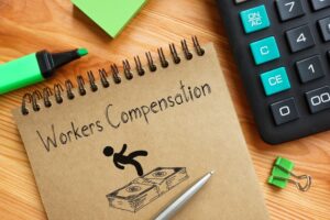 The text "Workers Compensation" is displayed on a business photo.